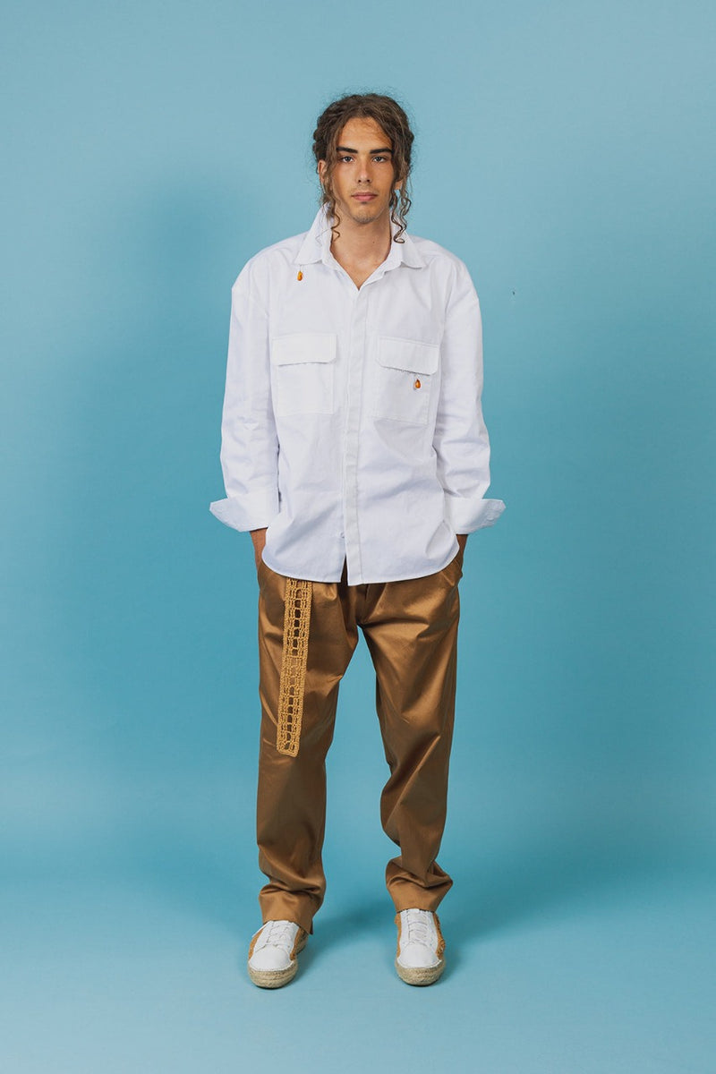 White twill cotton shirt with baseball hem that's longer on the back and rounds up on the sides.