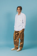 White twill cotton shirt with baseball hem that's longer on the back and rounds up on the sides.