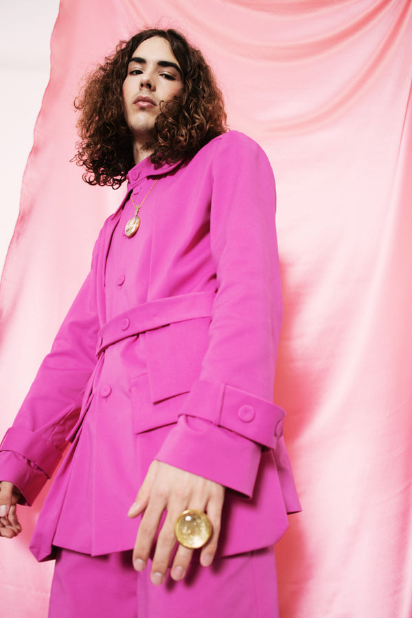 Hot pink statement safari-style jacket with a two-button belt.Hot pink statement safari-style jacket with a two-button belt.