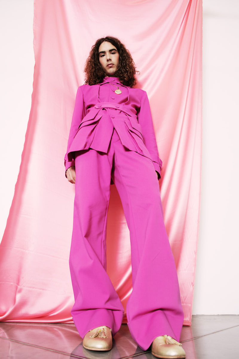 Hot pink statement safari-style wide leg trousers.