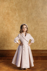 Tuxedo-inspired princess dress in sweet rose tone. 