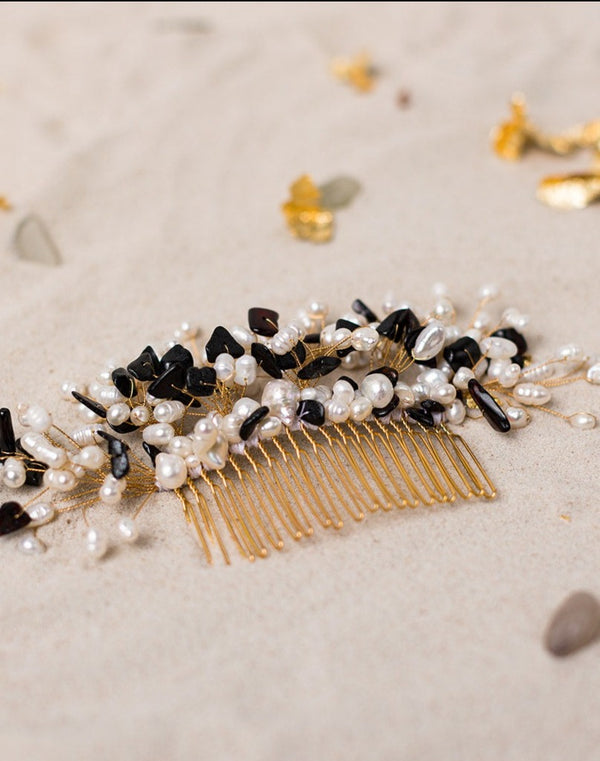 Magnificient hand-crafted hair comb embellished with freshwater pearls and dark Amber, that were collected on the Baltic coast.