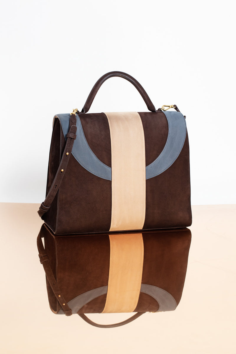Timeless fine suede handbag in 100 % genuine leather.