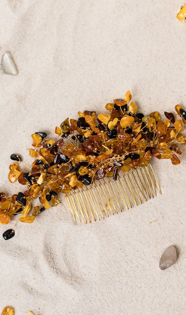 Exceptional hand-crafted hair comb embellished with royal Amber, that where collected on the Baltic coast.