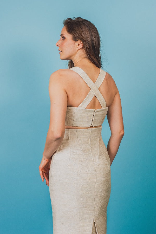 Linen and silk corset top with a cross-back neckline.