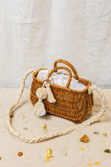 Exquisite wicker handbag with a double handle and linen inner bag that has a cotton lining expresses refined charm.