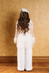 Gracious, soft white asymmetric blouse with inverted pleats from the waist down and a push-button fastening in the front.
