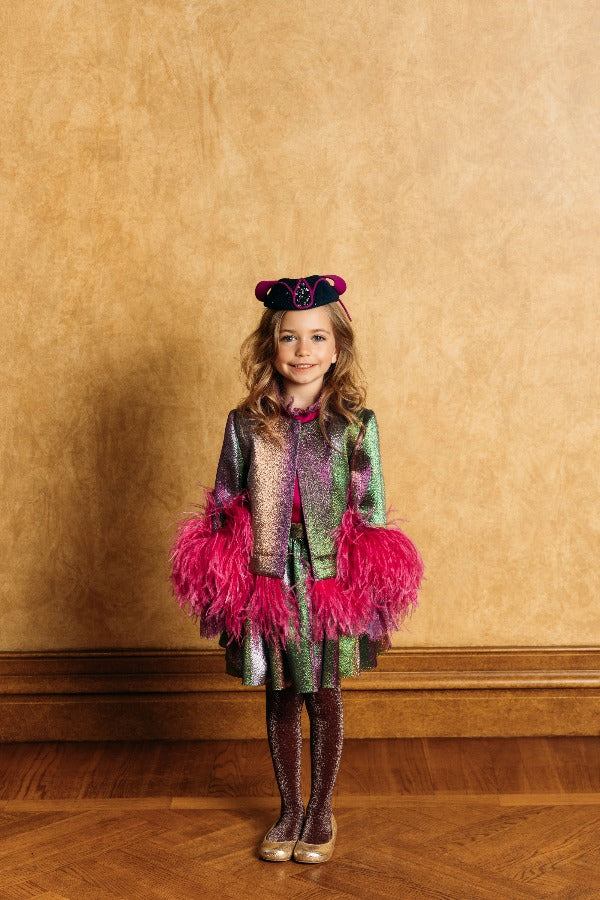 Magical chameleon jacket with magnificent fuchsia feathers along bottom and cuffs.