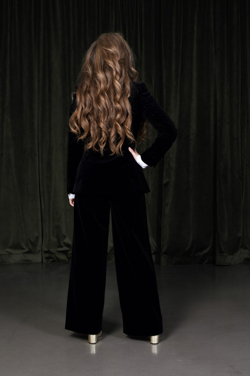 Timeless classic deep midnight black wide-leg silk and viscose trousers with a hidden side-zipper.