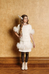 Above knee skirt with swan feathers and tweed fringe.